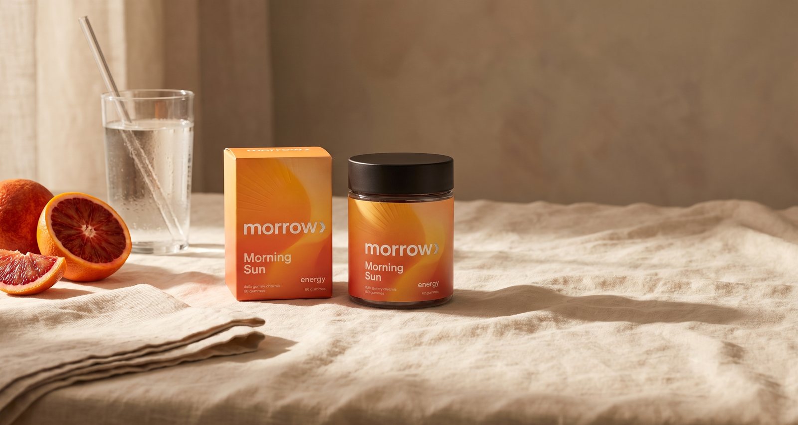 Morning Sun jar and carton beside blood oranges on linen
